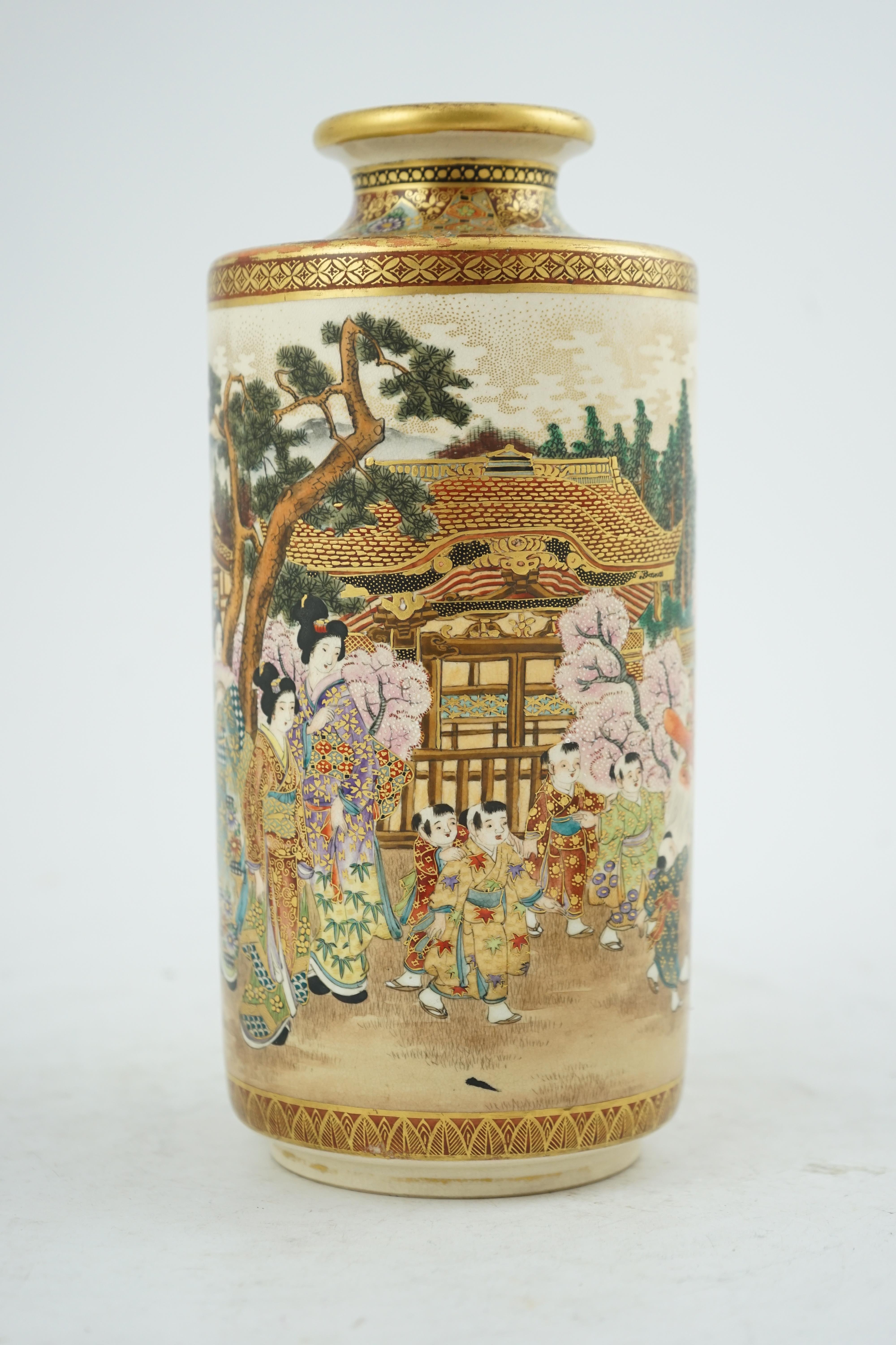 A Japanese Satsuma ‘Spring festival’ cylindrical vase, Meiji period